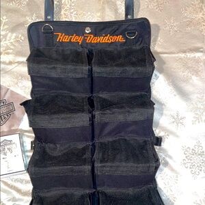 Harley Davidson Black Travel Organizer with 8 Velcro pockets.